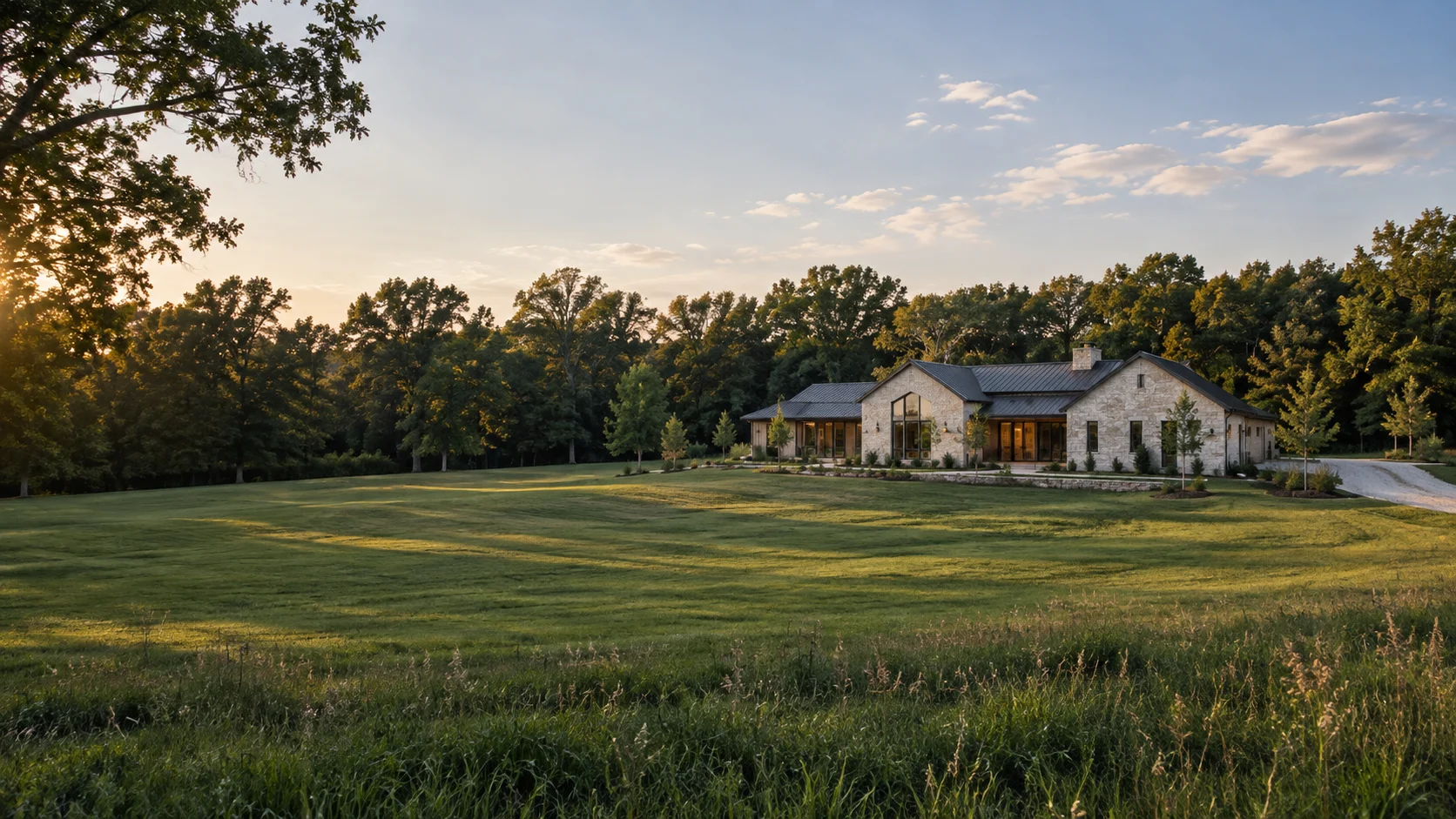 Concept image of a limestone home on gently rolling Midwest acreage